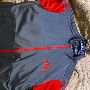 Red and grey adidas zip up